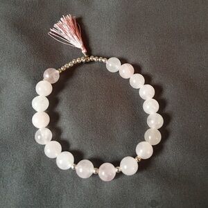 Genuine pink rose quartz and sterling silver beaded bracelet